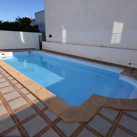 Piscina *